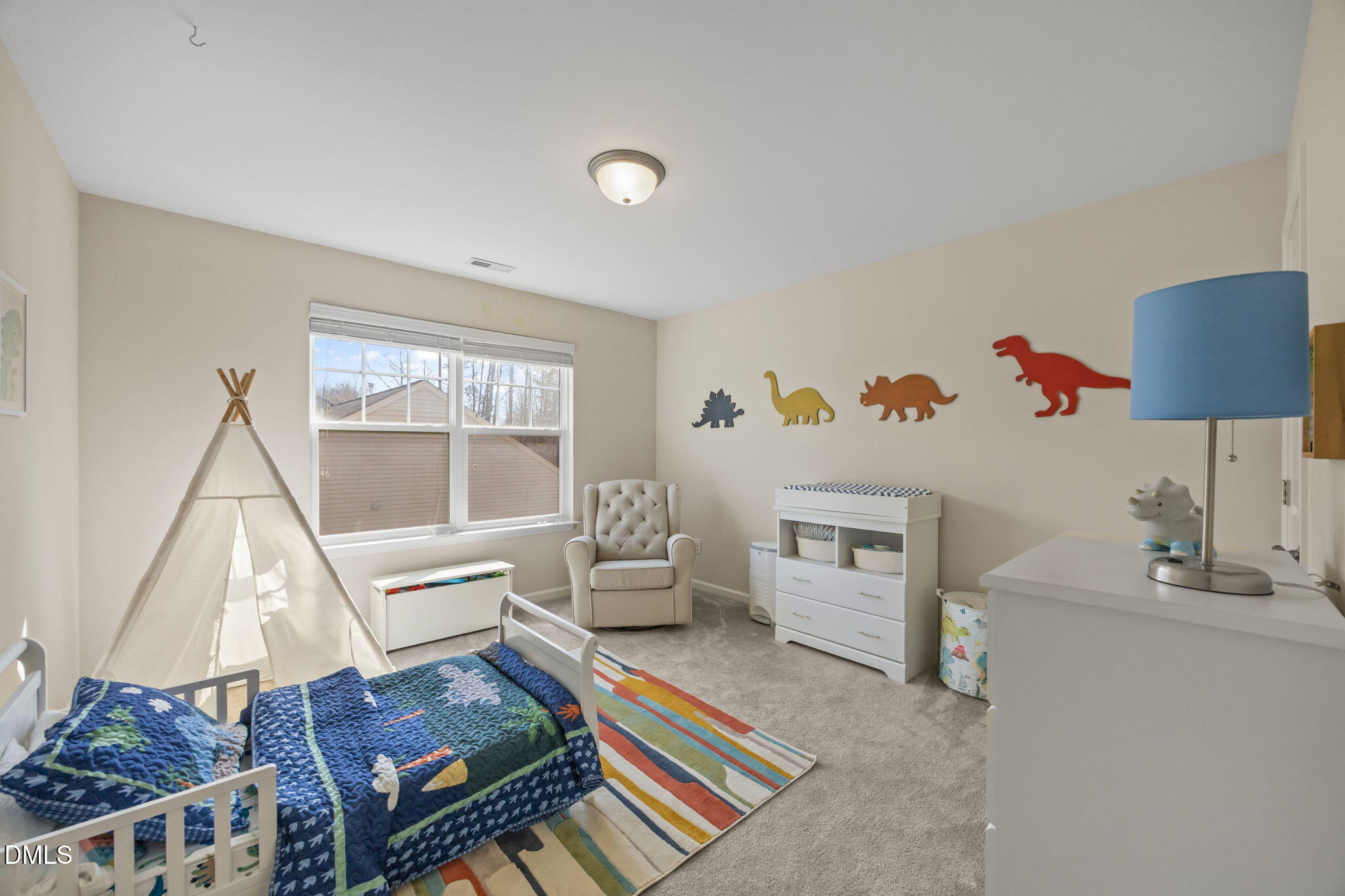 2329 Longshadow Drive Graham, NC 27253 - Photo 41 of 52 a living room with furniture and a window