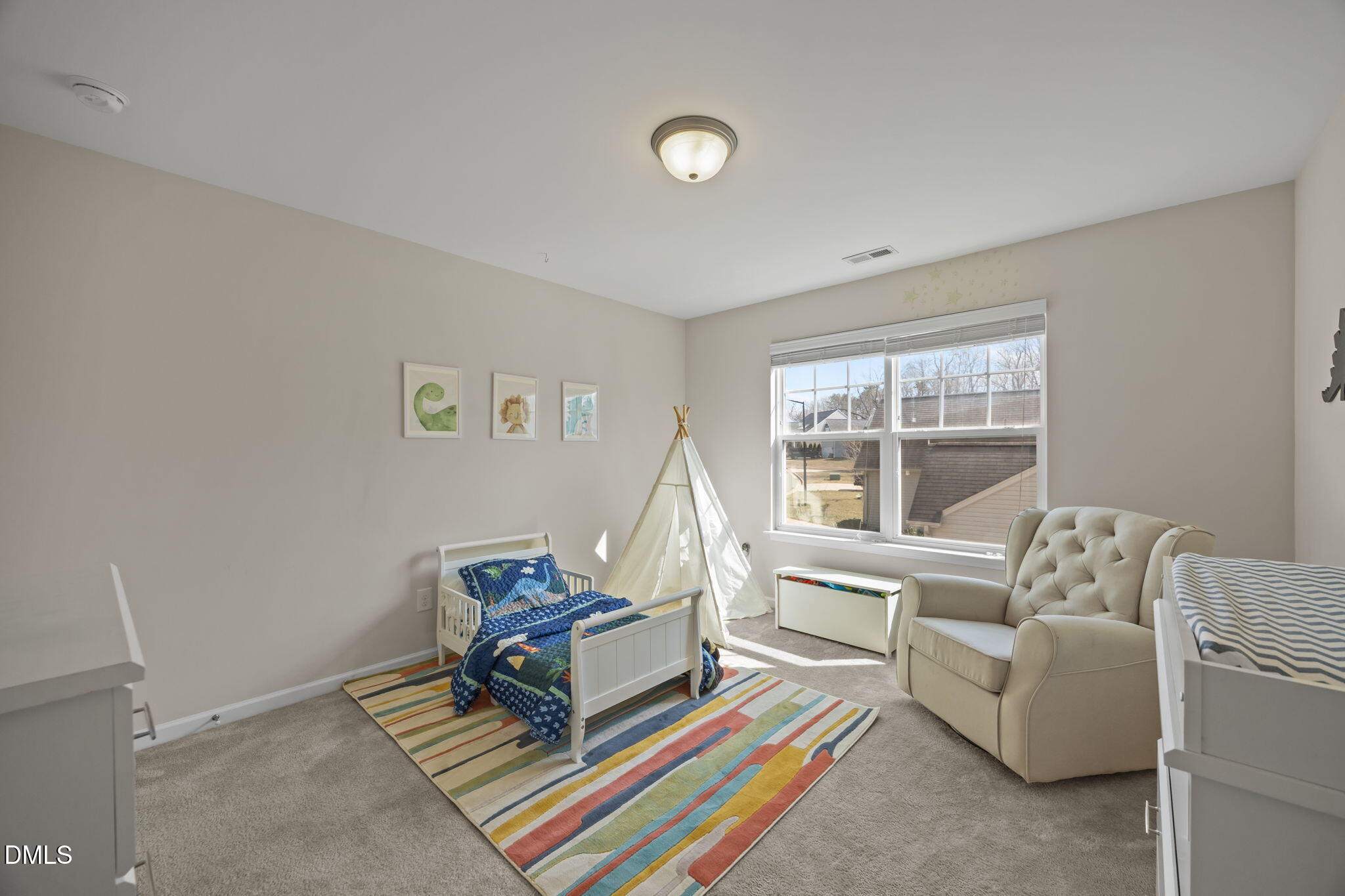 2329 Longshadow Drive Graham, NC 27253 - Photo 42 of 52 a living room with furniture and a window