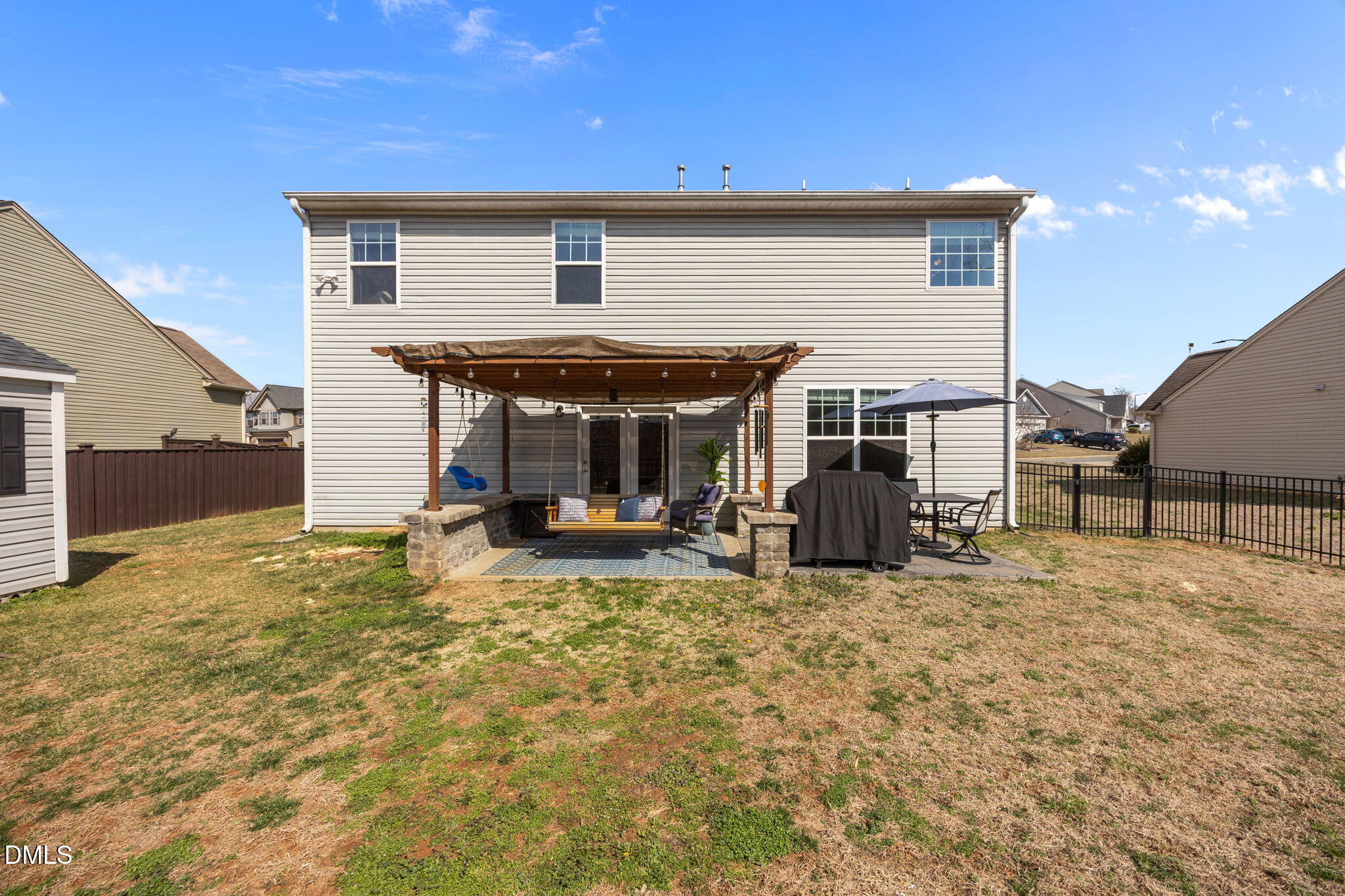 2329 Longshadow Drive Graham, NC 27253 - Photo 46 of 52 a view of a house with a patio and a yard