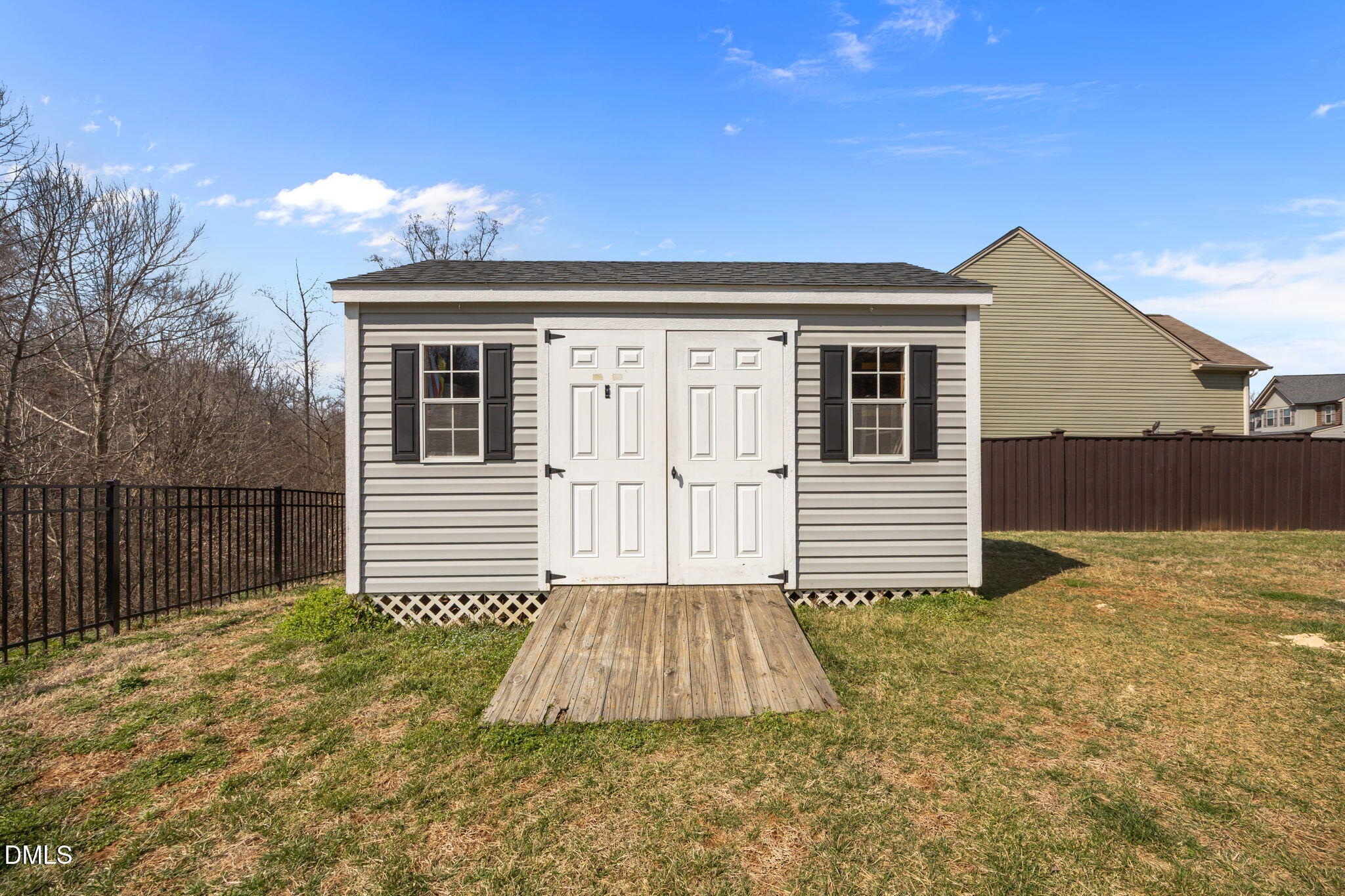 2329 Longshadow Drive Graham, NC 27253 - Photo 48 of 52 a front view of a house with a yard