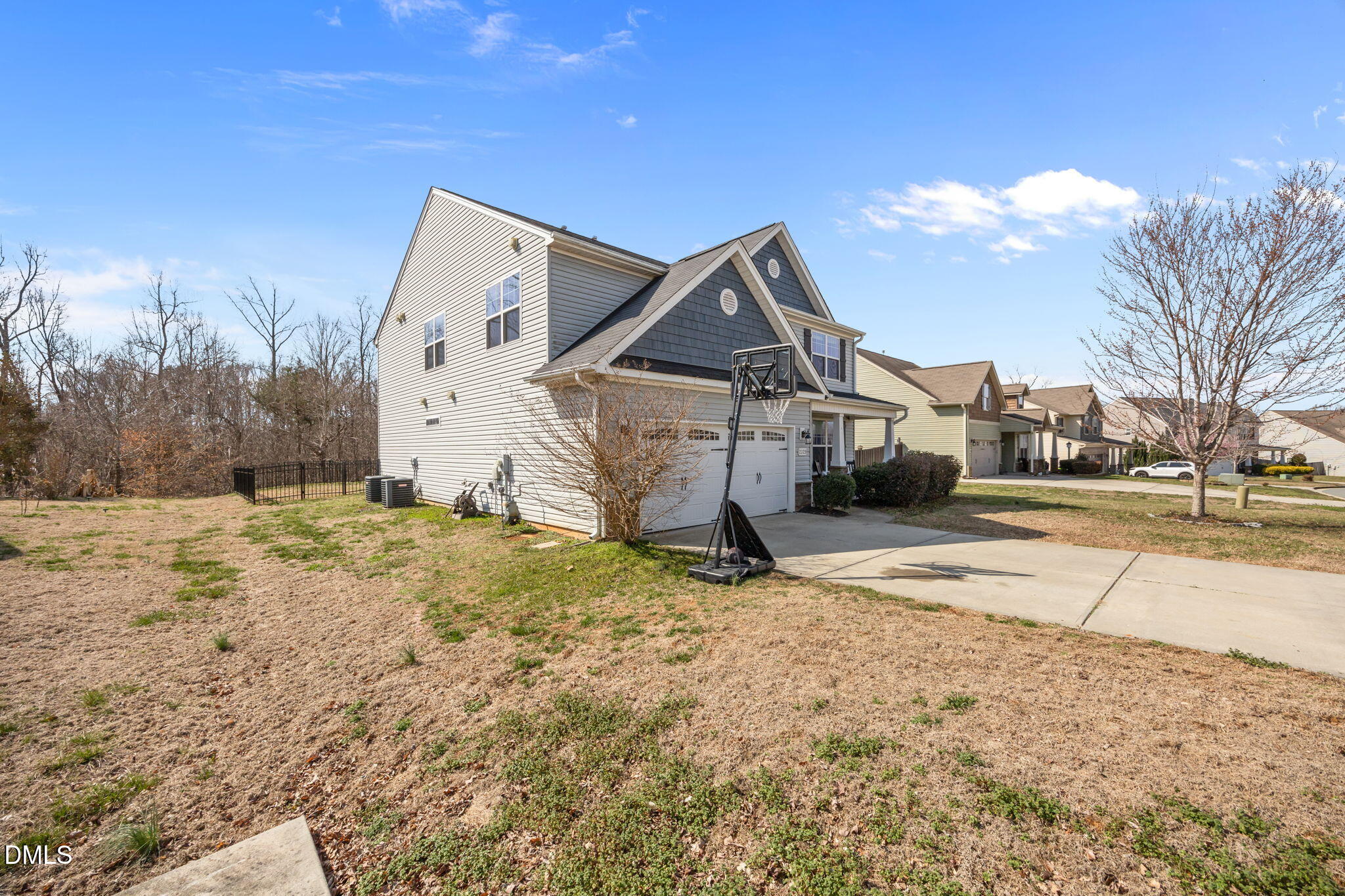 2329 Longshadow Drive Graham, NC 27253 - Photo 5 of 52 a view of a house with a yard