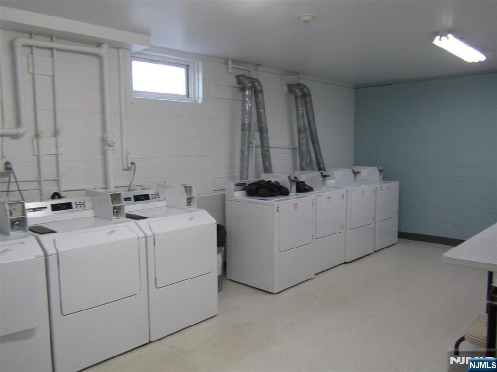 360 Knickerbocker Road, Unit 24 Dumont, NJ 07628 - Photo 8 of 8 a bathroom with a sink and a mirror