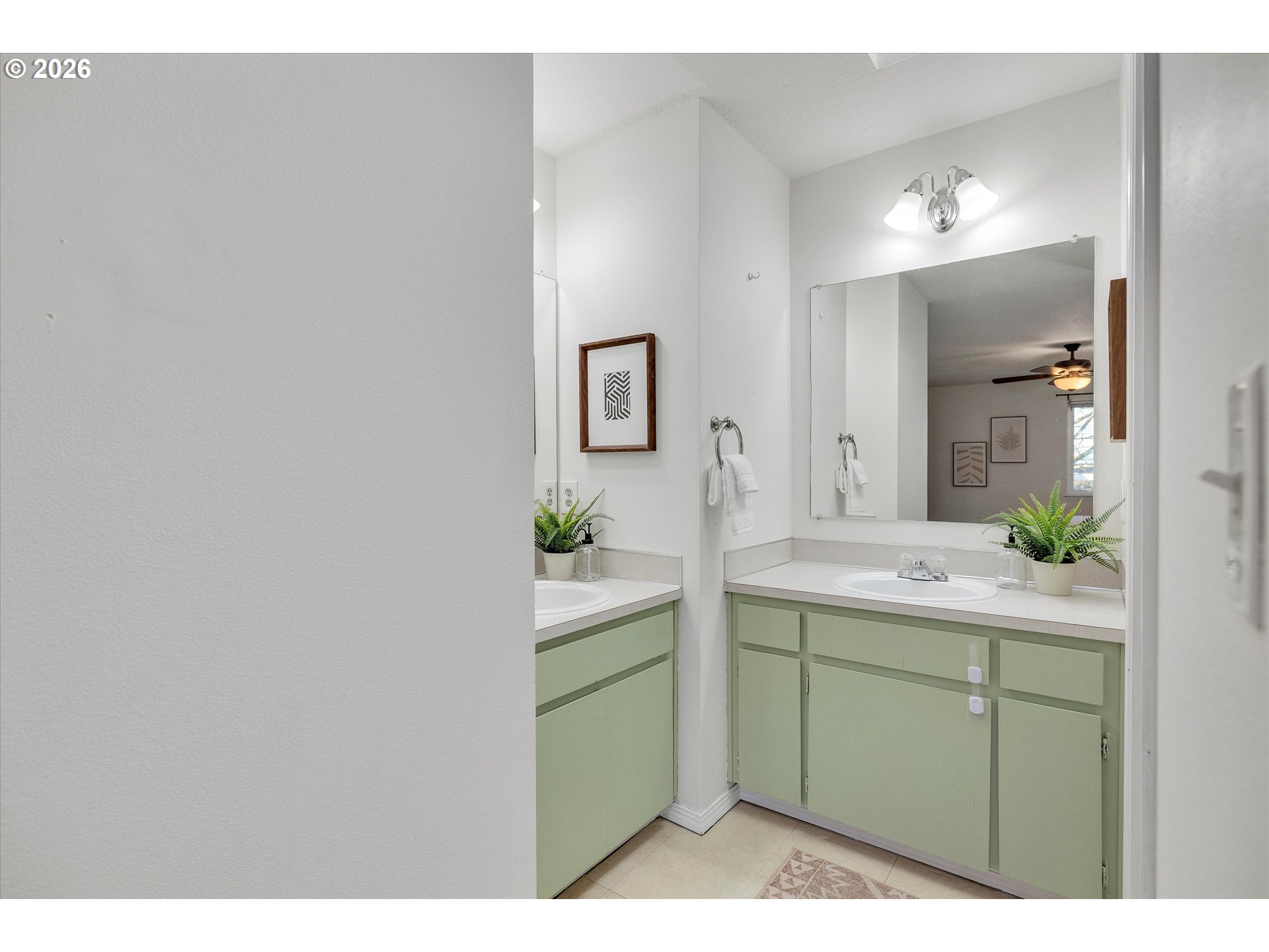 16082 Southwest 93rd Avenue Tigard, OR 97224 - Photo 22 of 35 a bathroom with a sink and a mirror