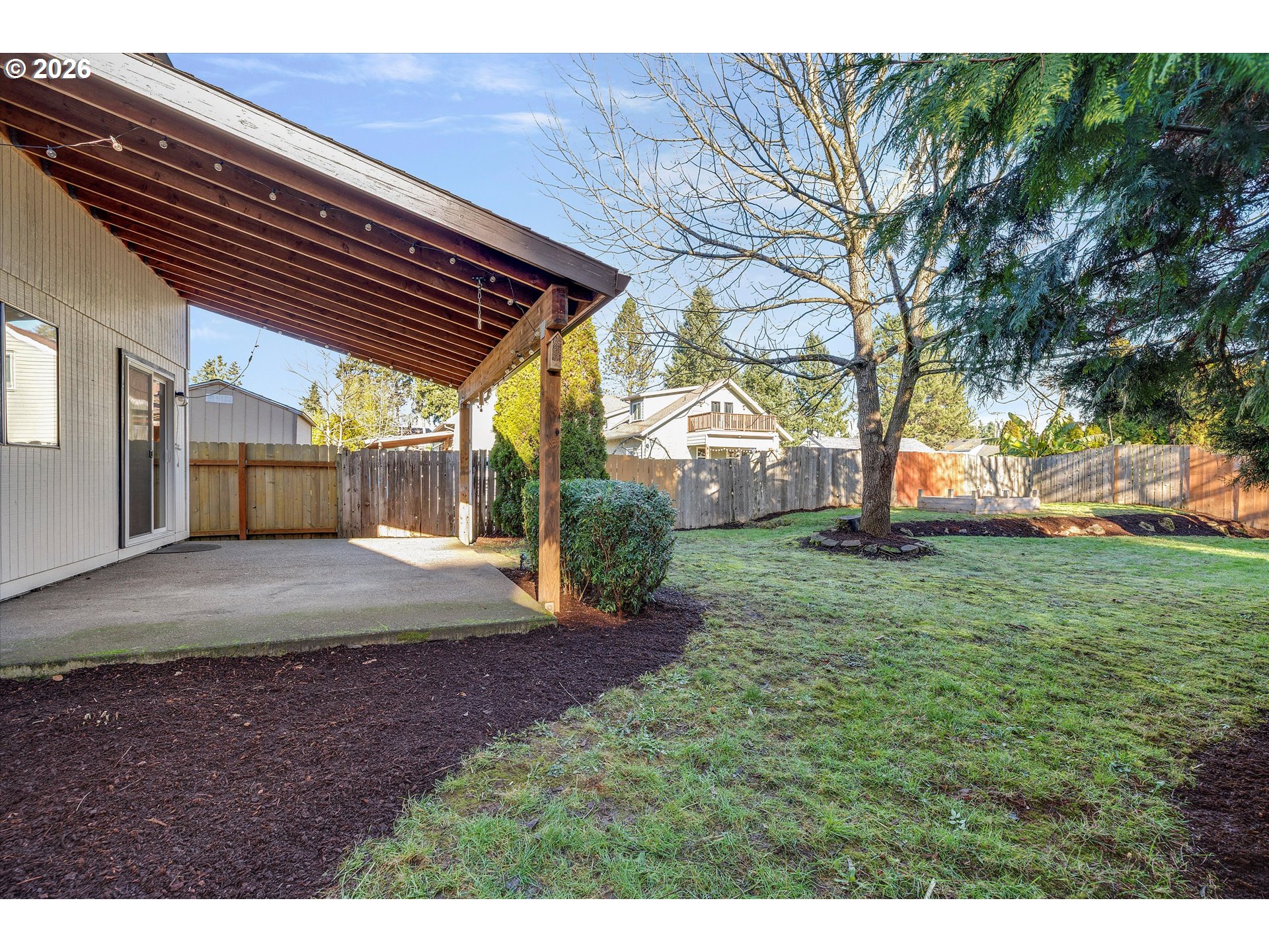 16082 Southwest 93rd Avenue Tigard, OR 97224 - Photo 32 of 35 a view of a backyard with large trees