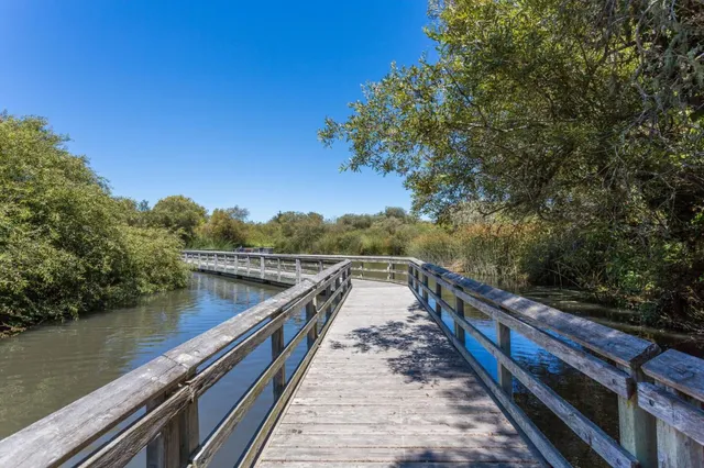 a view of balcony and yard