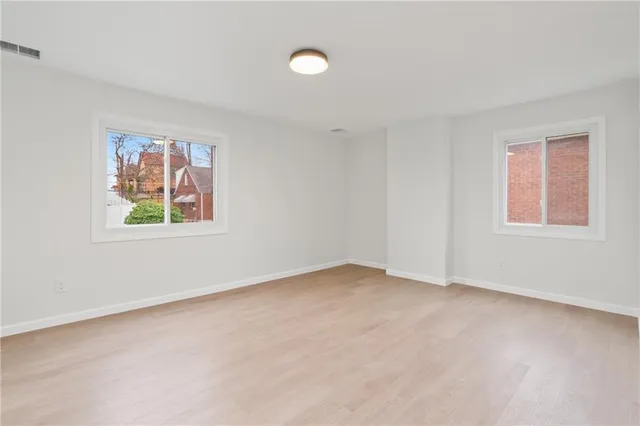 an empty room with windows