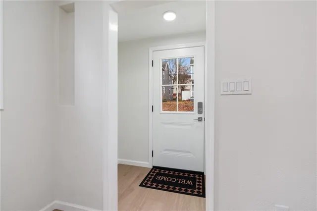 a bathroom with a sink and a window
