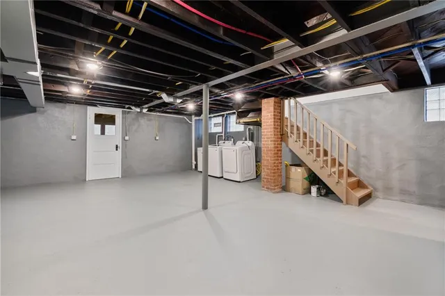 a view of an empty room with storage