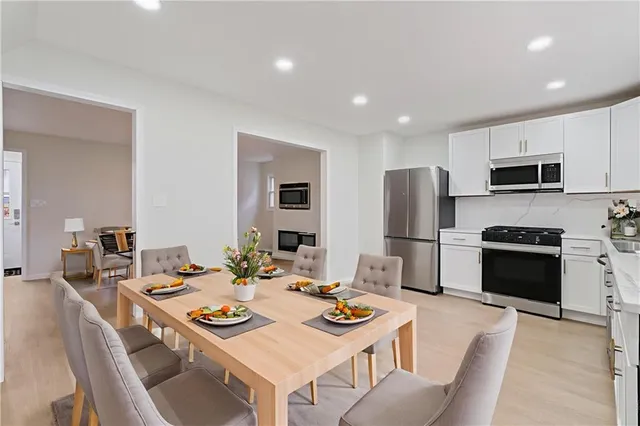 a view of a dining room with furniture