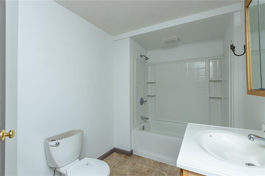 400 West Fulton Street Butler, PA 16001 - Photo 22 of 22 a bathroom with a sink and a tub