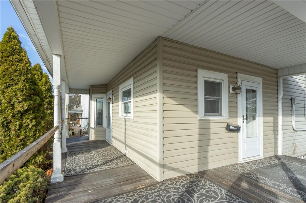 400 West Fulton Street Butler, PA 16001 - Photo 6 of 22 a view of a porch with a table and chairs