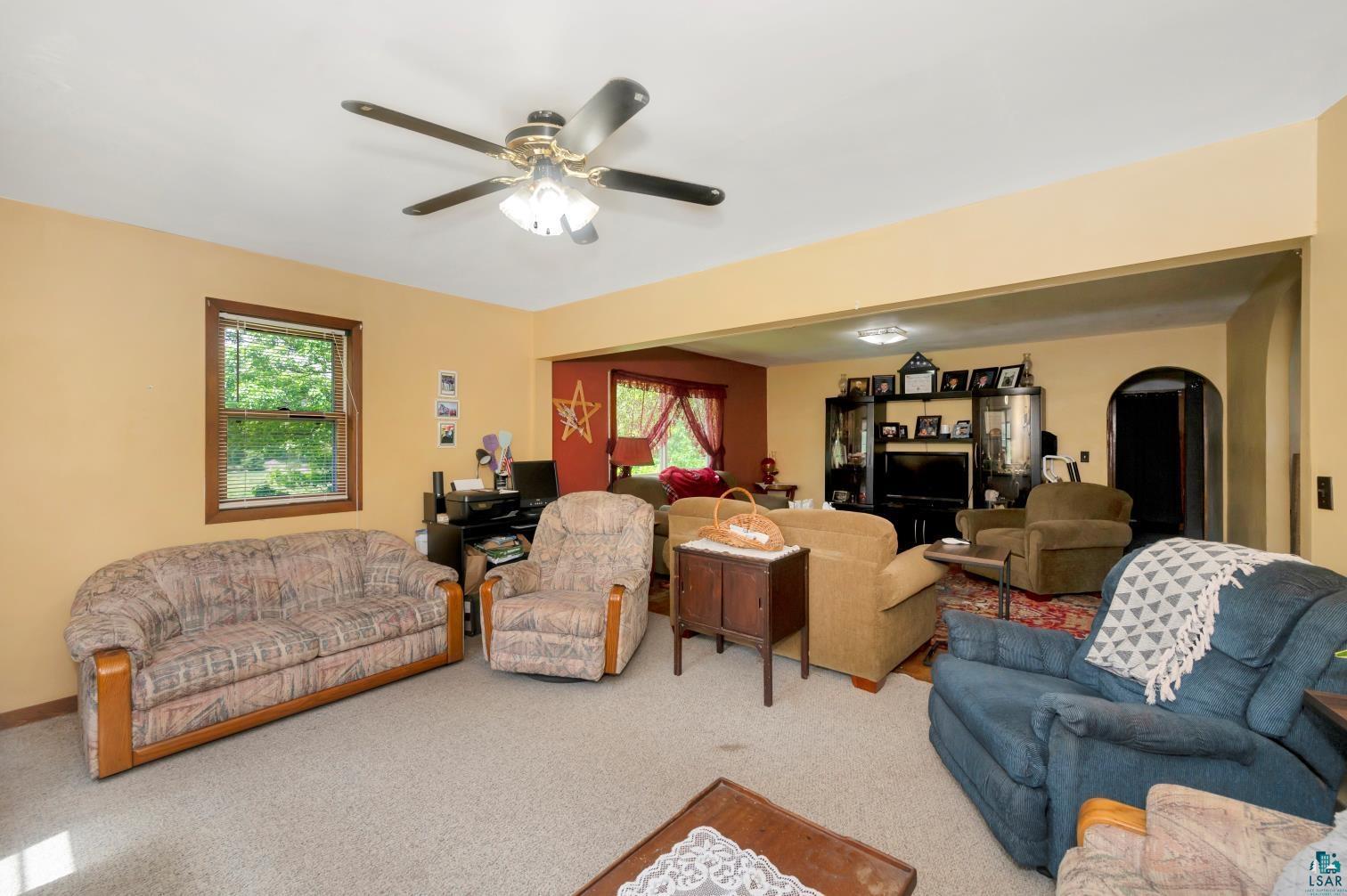5704 Kespohl Road Floodwood, MN 55736 - Photo 12 of 26 Living room featuring carpet and ceiling fan