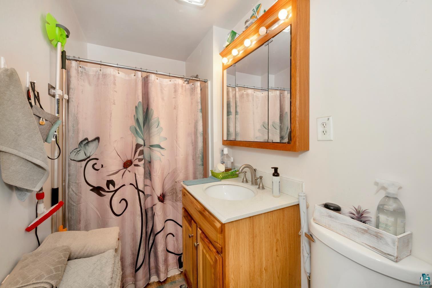 5704 Kespohl Road Floodwood, MN 55736 - Photo 15 of 26 Bathroom with vanity and toilet