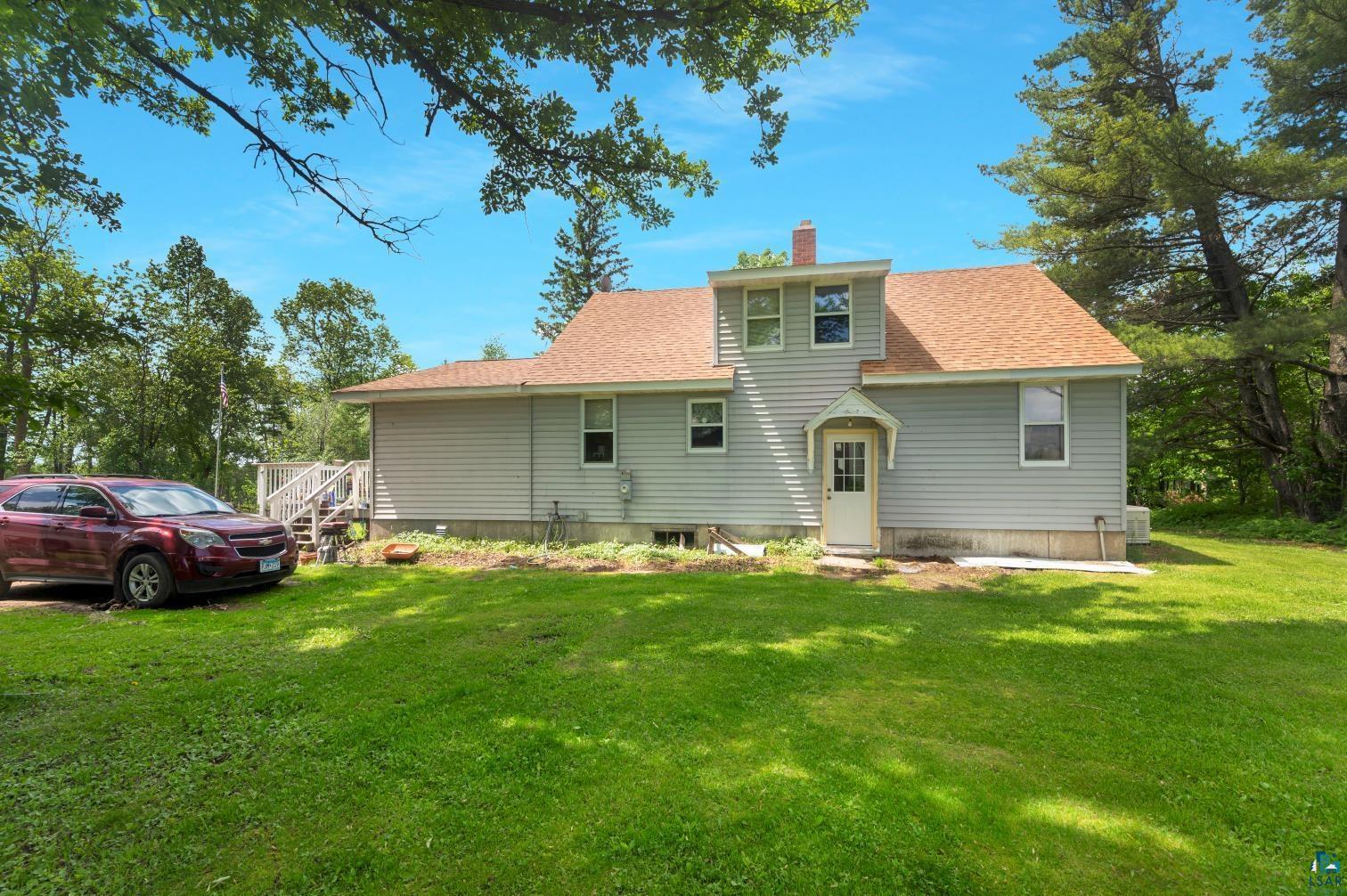 5704 Kespohl Road Floodwood, MN 55736 - Photo 25 of 26 Back of house featuring a yard