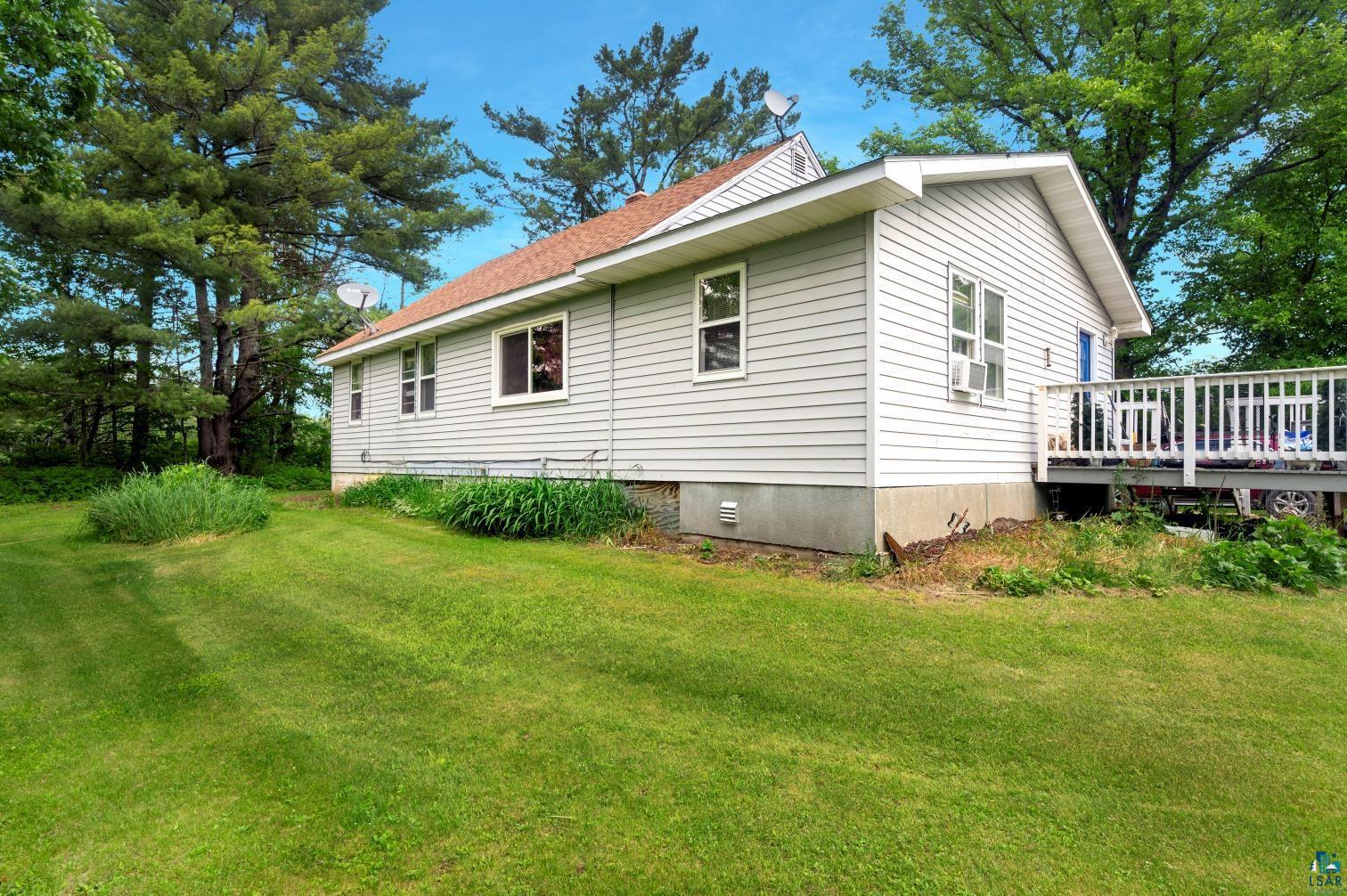 5704 Kespohl Road Floodwood, MN 55736 - Photo 8 of 26 Back of property with a yard and a wooden deck