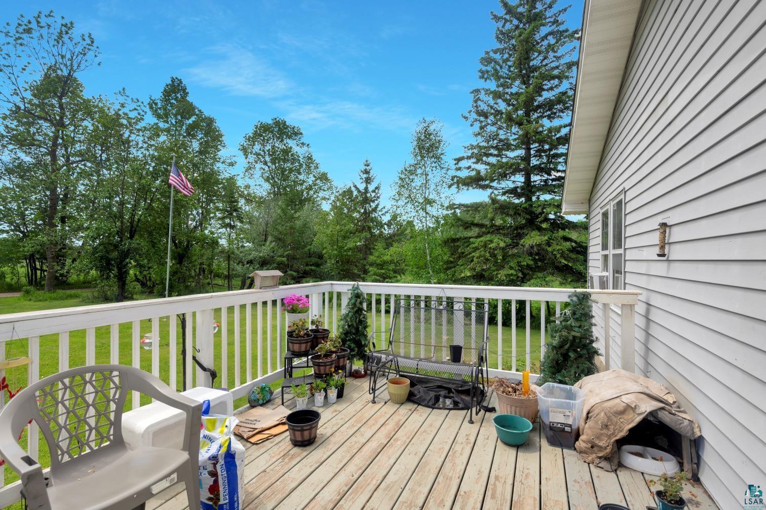 5704 Kespohl Road Floodwood, MN 55736 - Photo 9 of 26 Wooden terrace with a lawn
