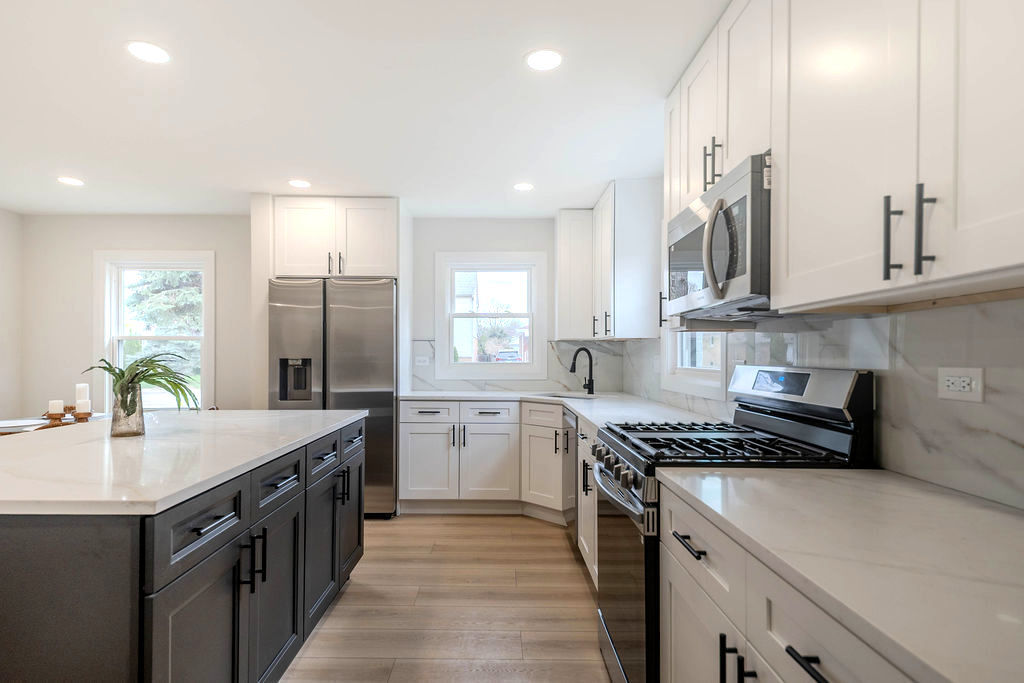 6964 West Cleveland Street Niles, IL 60714 - Photo 9 of 25 a kitchen with a sink stove and cabinets