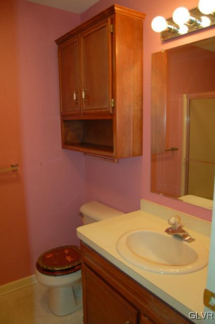 853 Cold Spring Road, Unit 6 Allentown, PA 18103 - Photo 16 of 23 a bathroom with a sink toilet and shower