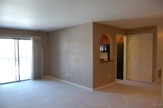 853 Cold Spring Road, Unit 6 Allentown, PA 18103 - Photo 2 of 23 an empty room with windows and closet