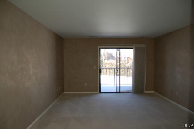 853 Cold Spring Road, Unit 6 Allentown, PA 18103 - Photo 3 of 23 an empty room with windows