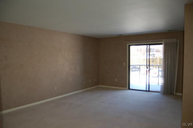 853 Cold Spring Road, Unit 6 Allentown, PA 18103 - Photo 4 of 23 an empty room with a window