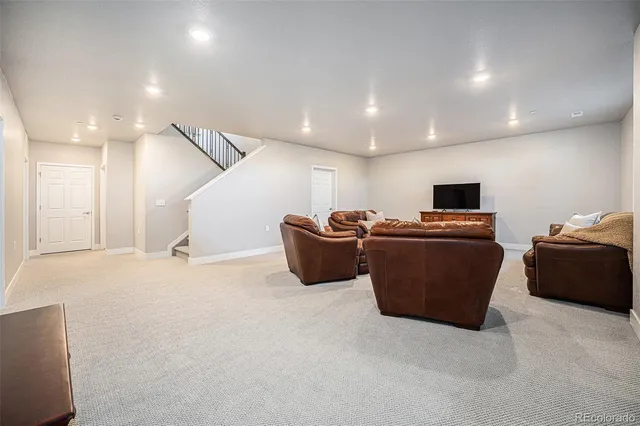 a bedroom with a bed and a tv