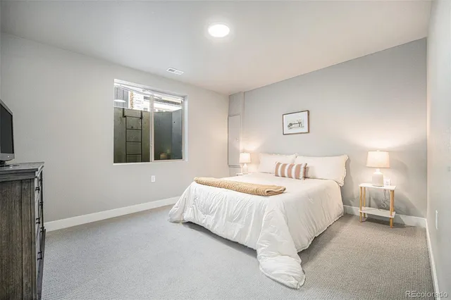 a view of a balcony with wooden floor