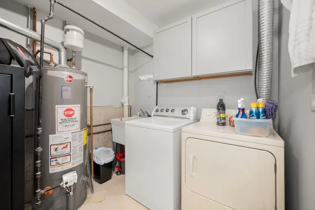 a front view of a residential apartment building with a yard