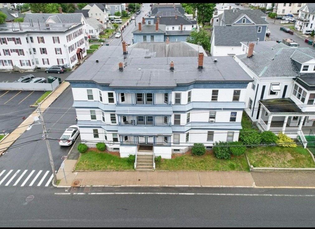 304 Pawtucket Street, Unit 2 Lowell, MA 01854 - Photo 2 of 16 a aerial view of a house