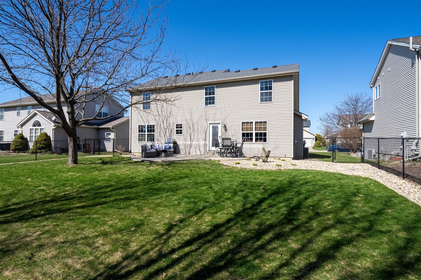 3291 Red Jasper Street Normal, IL 61761 - Photo 14 of 48 a view of a house with backyard and sitting area
