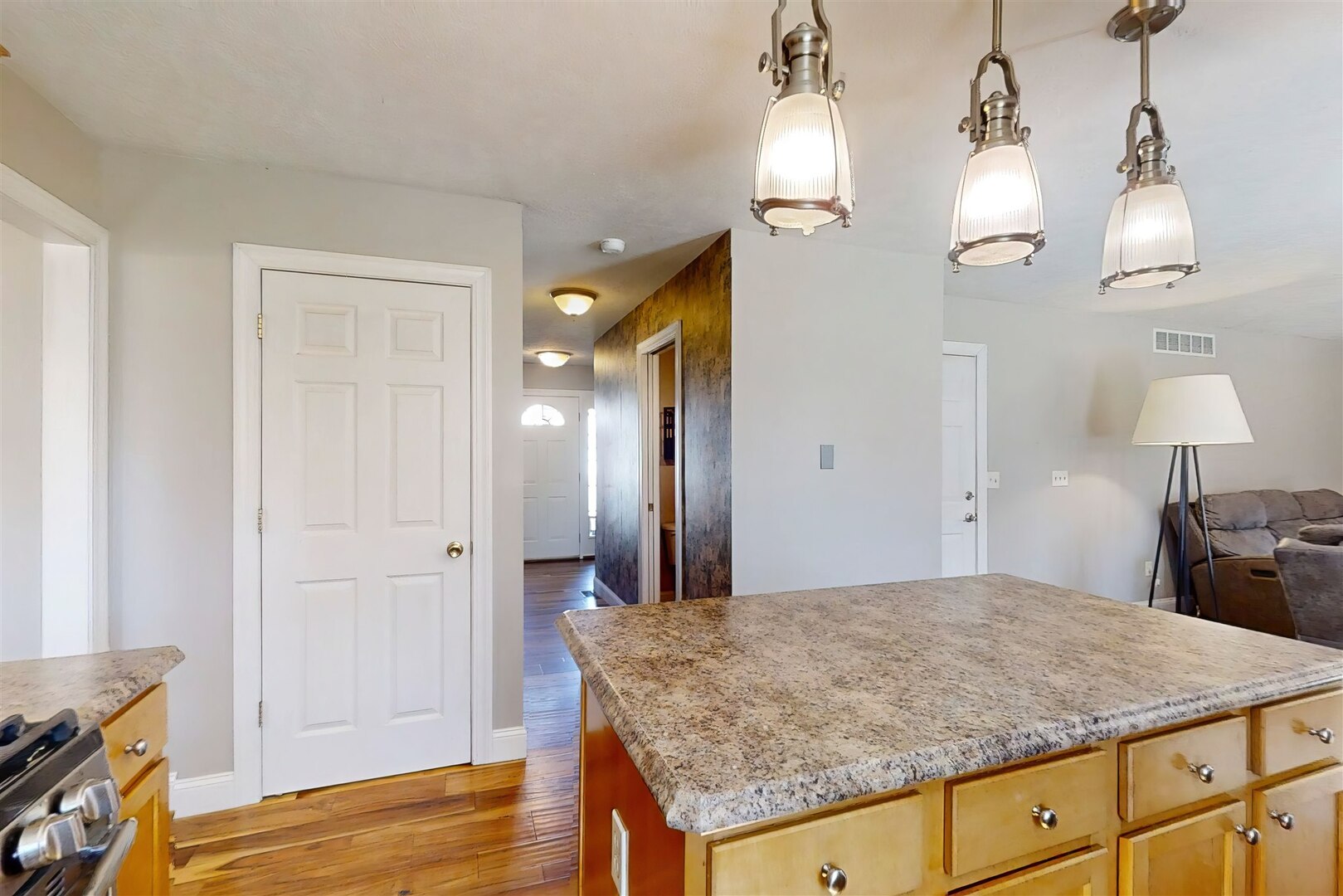 3291 Red Jasper Street Normal, IL 61761 - Photo 20 of 48 a view of a kitchen cabinets and wooden floor