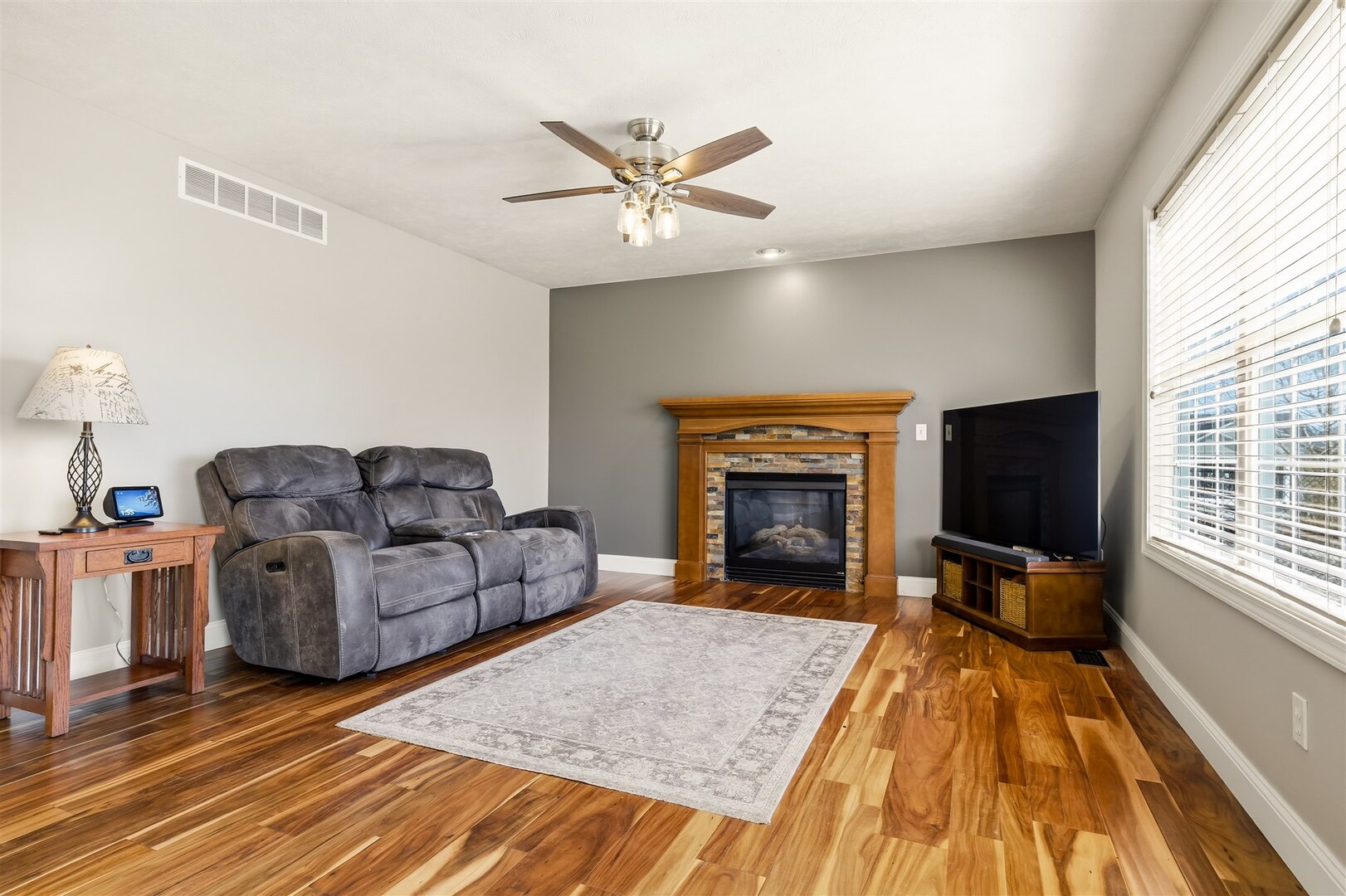 3291 Red Jasper Street Normal, IL 61761 - Photo 23 of 48 a living room with furniture and a fireplace