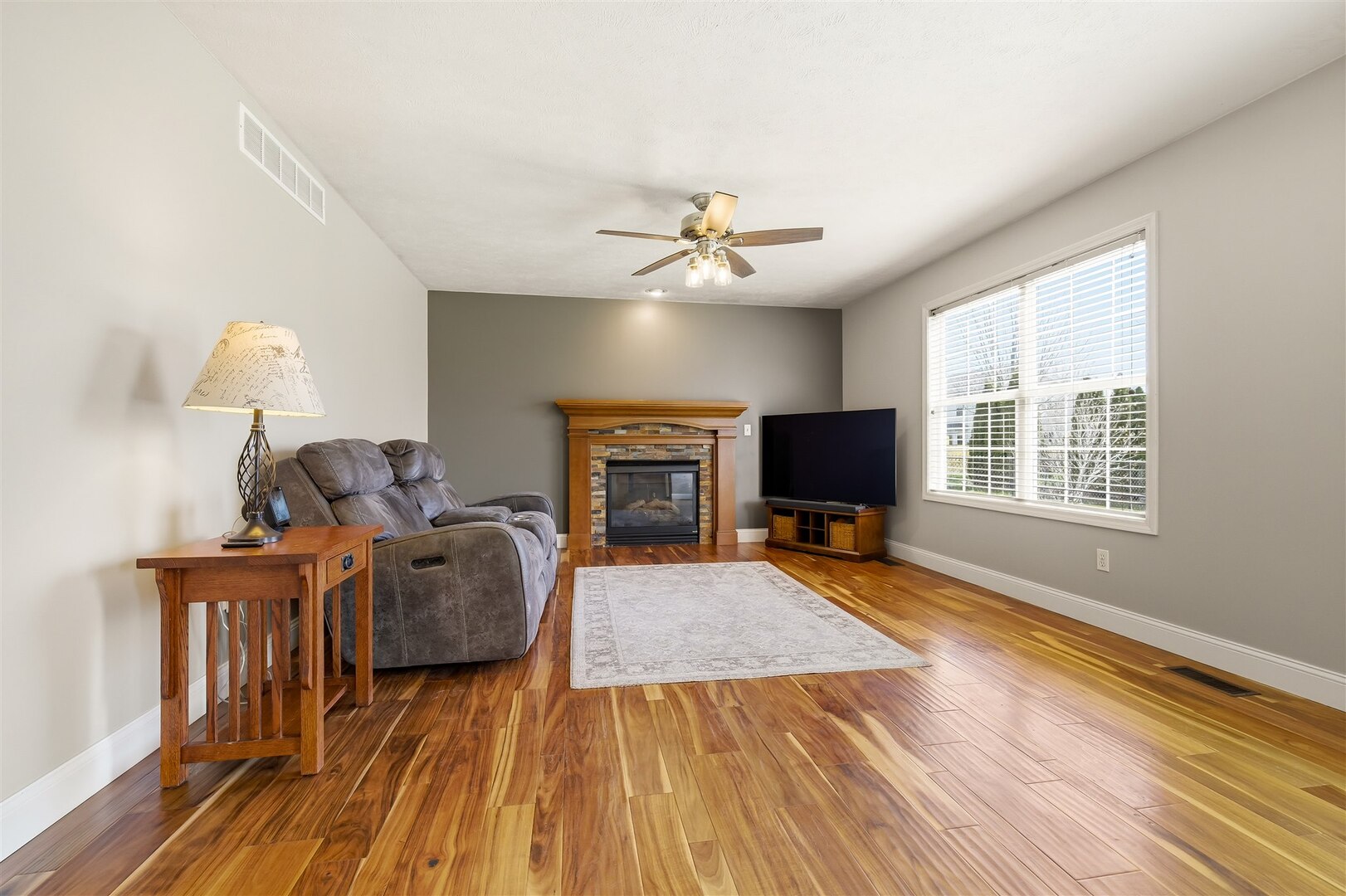 3291 Red Jasper Street Normal, IL 61761 - Photo 24 of 48 a living room with furniture and a fireplace