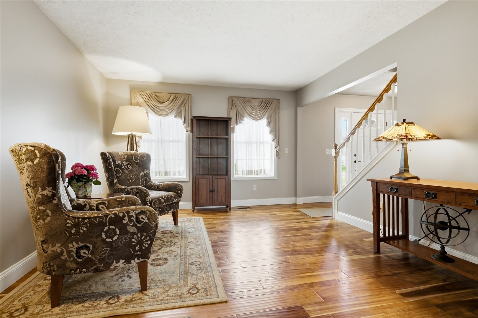 3291 Red Jasper Street Normal, IL 61761 - Photo 27 of 48 a living room with furniture and a wooden floor
