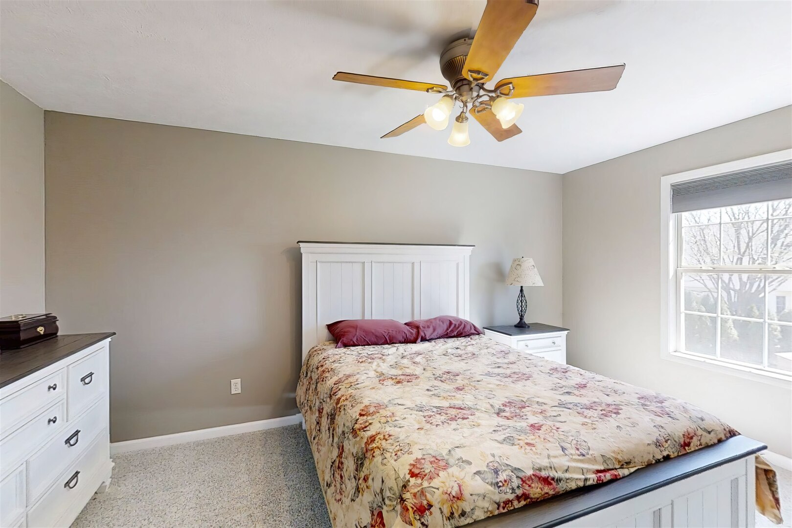 3291 Red Jasper Street Normal, IL 61761 - Photo 43 of 48 a bed sitting in a bedroom next to a window