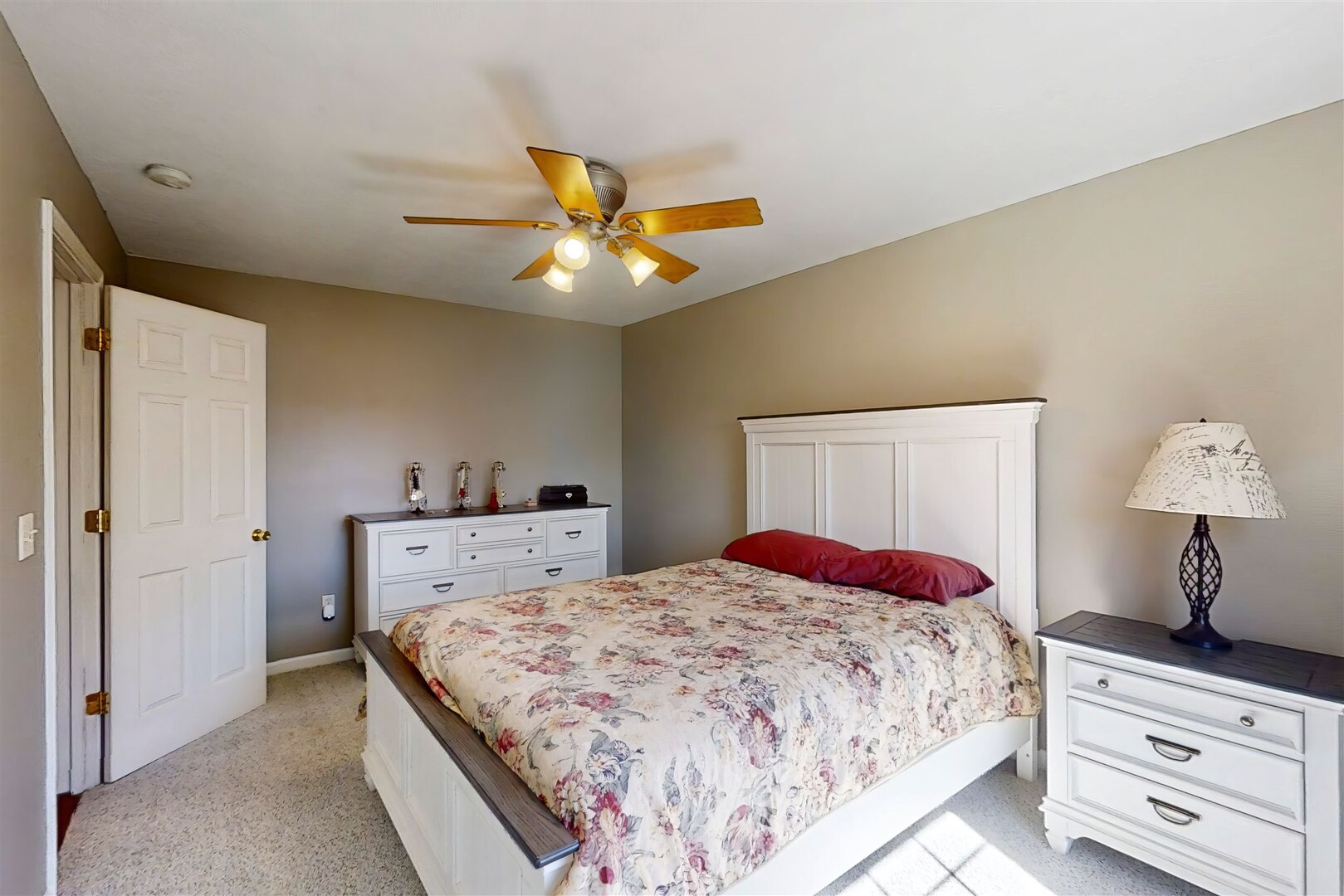 3291 Red Jasper Street Normal, IL 61761 - Photo 45 of 48 a bedroom with a bed and a chandelier