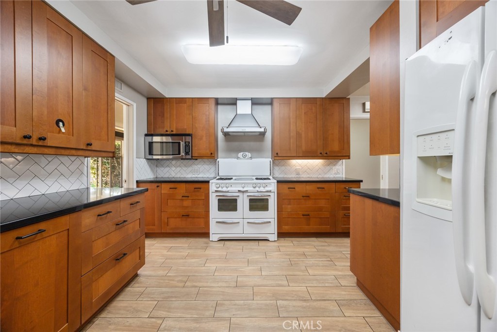 10357 Lesterford Avenue Downey, CA 90241 - Photo 13 of 31 Spacious and efficient can describe the kitchen at 10357 Lesterford Avenue
