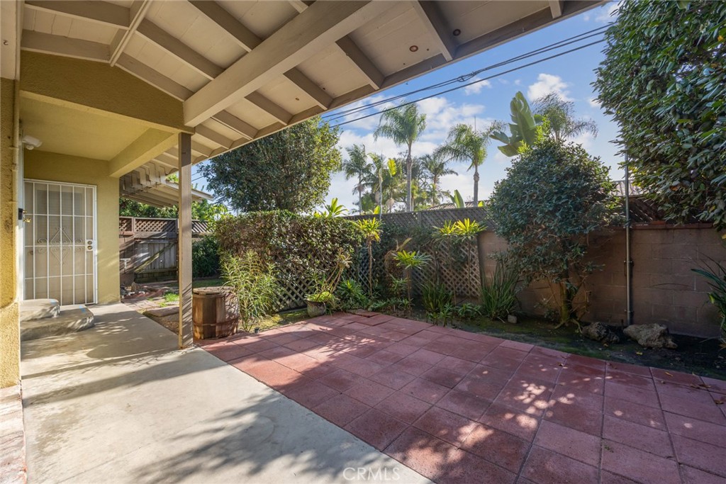 10357 Lesterford Avenue Downey, CA 90241 - Photo 23 of 31 The quaint side yard and covered walkway at 10357 Lesterford Avenue