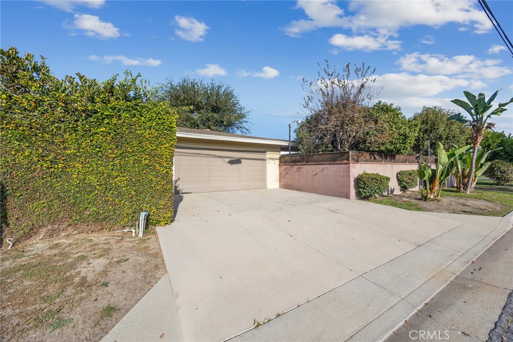 10357 Lesterford Avenue Downey, CA 90241 - Photo 28 of 31 The oversized two car garage and driveway at 10357 Lesterford Avenue