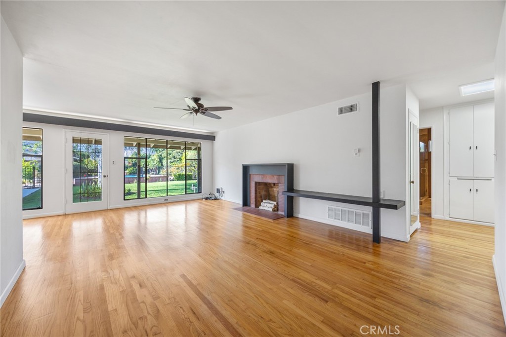 10357 Lesterford Avenue Downey, CA 90241 - Photo 3 of 31 Step inside to the spacious living room at 10357 Lesterford Avenue, Downey.