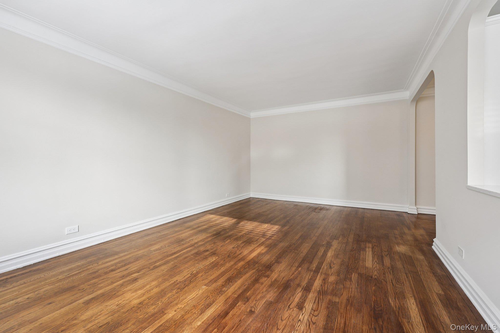 1 Bronxville Road, Unit 3S Bronxville, NY 10708 - Photo 11 of 27 wood-style floors, ornamental molding, and arched walkways