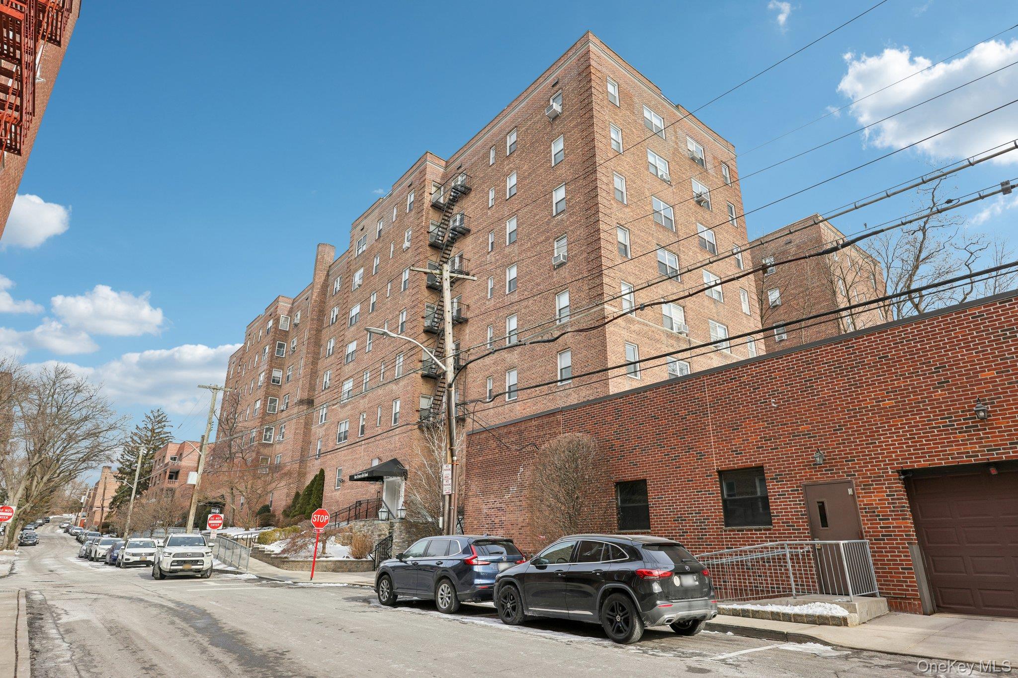 1 Bronxville Road, Unit 3S Bronxville, NY 10708 - Photo 13 of 27 a car parked in front of a building