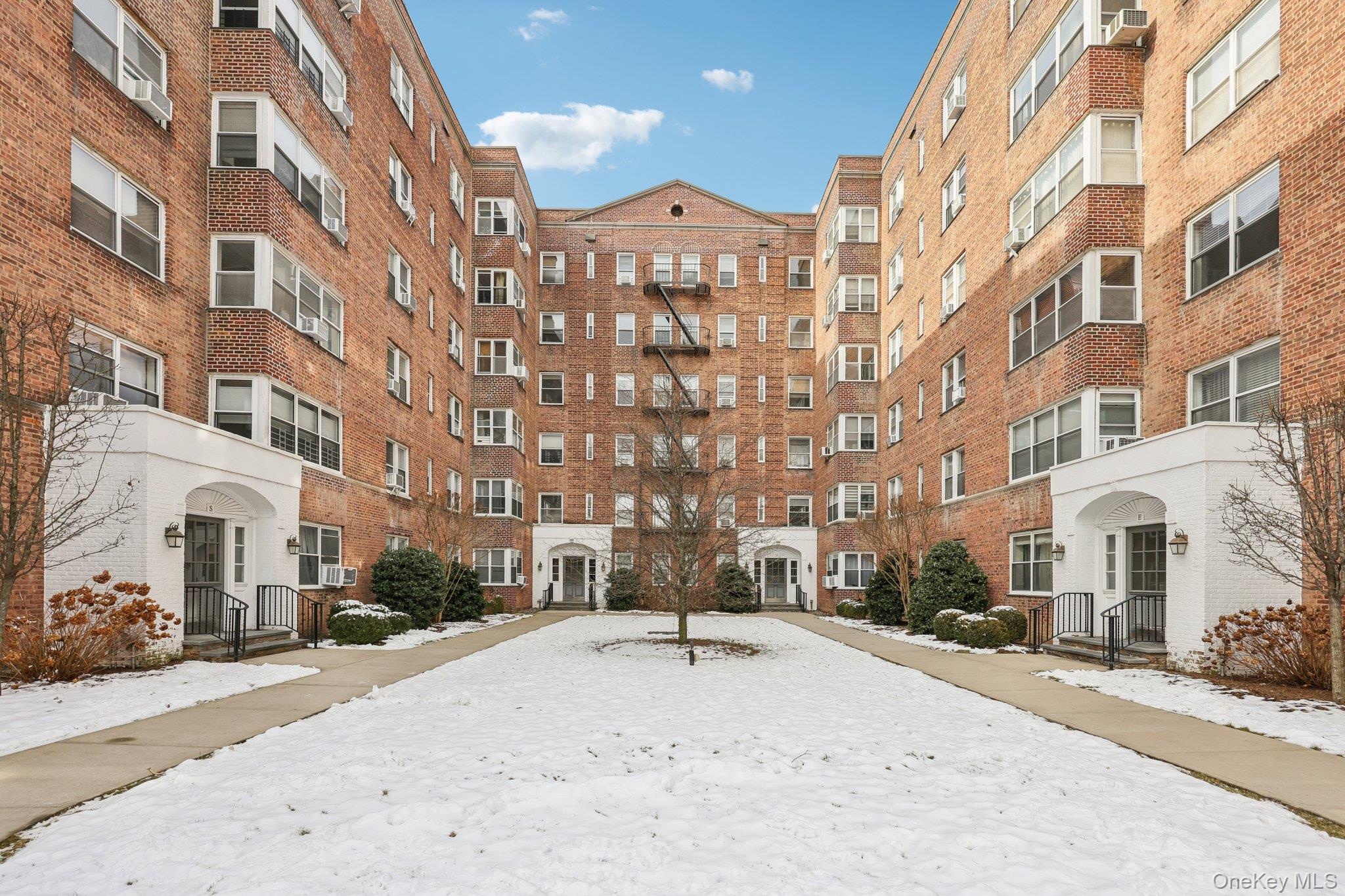 1 Bronxville Road, Unit 3S Bronxville, NY 10708 - Photo 25 of 27 Snow covered property with a view of apartment building / complex