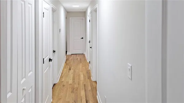 a view of a bathroom from the hallway