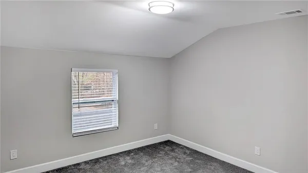 a view of a room with a window