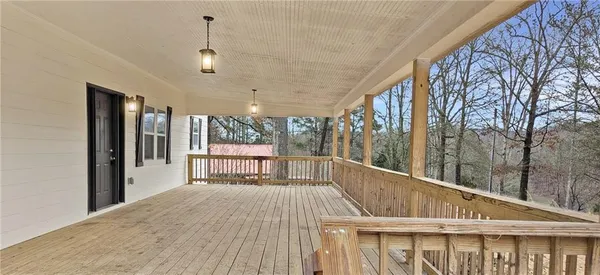 a view of balcony with furniture