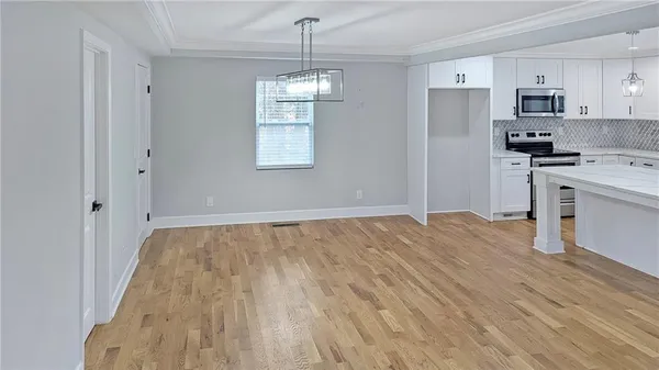 a view of kitchen and sink