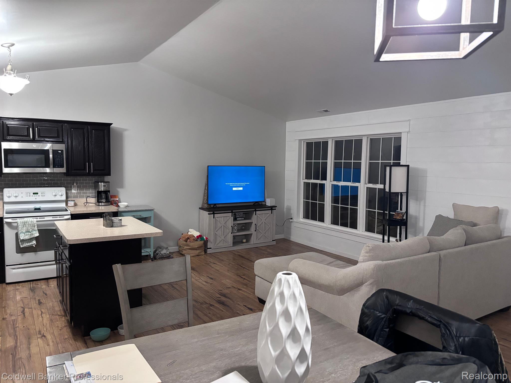 33540 Utica Road, Unit 13 Fraser, MI 48026 - Photo 9 of 20 Great room view from Dining room