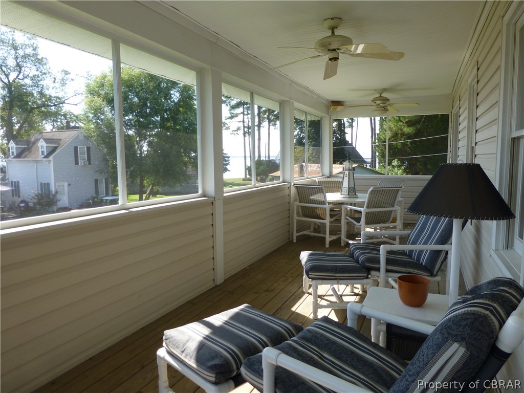 464 Jackson Creek Road Deltaville, VA 23043 - Photo 6 of 26 Another view of screen porch with views to Bay