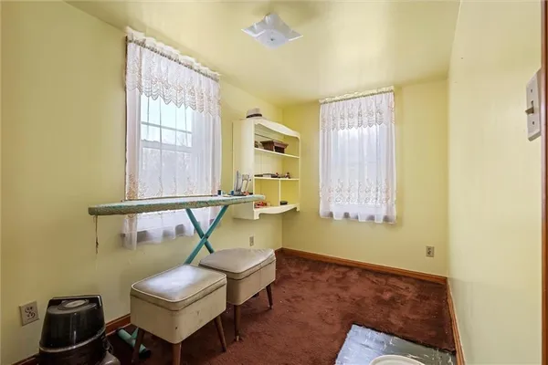 a view of work room with windows